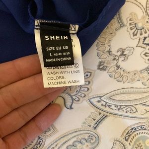 Royal blue size large SHEIN off the shoulder blouse. Really pretty.